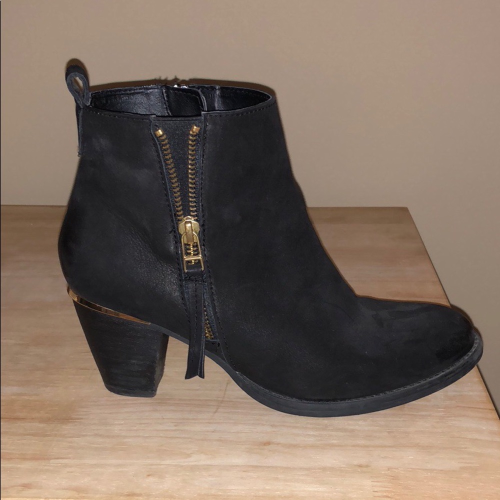 Stylish Black booties with gold accents